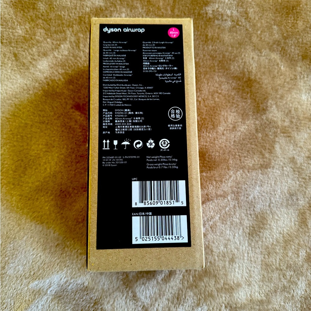 Dyson Airwrap set of long curler attachments.
